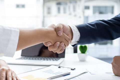 Business people shaking hands